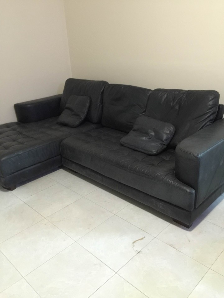 Thanh lý sofa da thật màu đen L giá rẻ